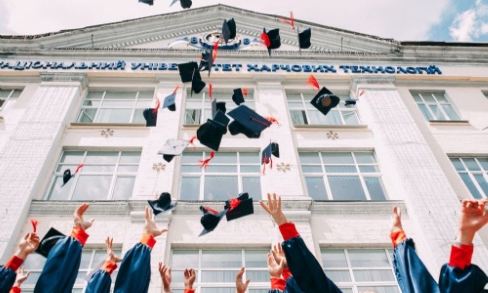 Students celebrating graduation